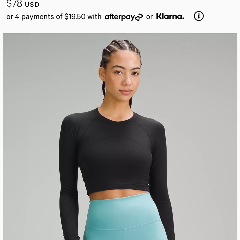 Lulu Lemon Athletica - Black, long sleeve crop top.